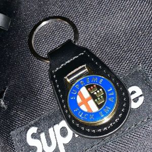 NEW Supreme Fuck Em All Enamel Leather Keychain